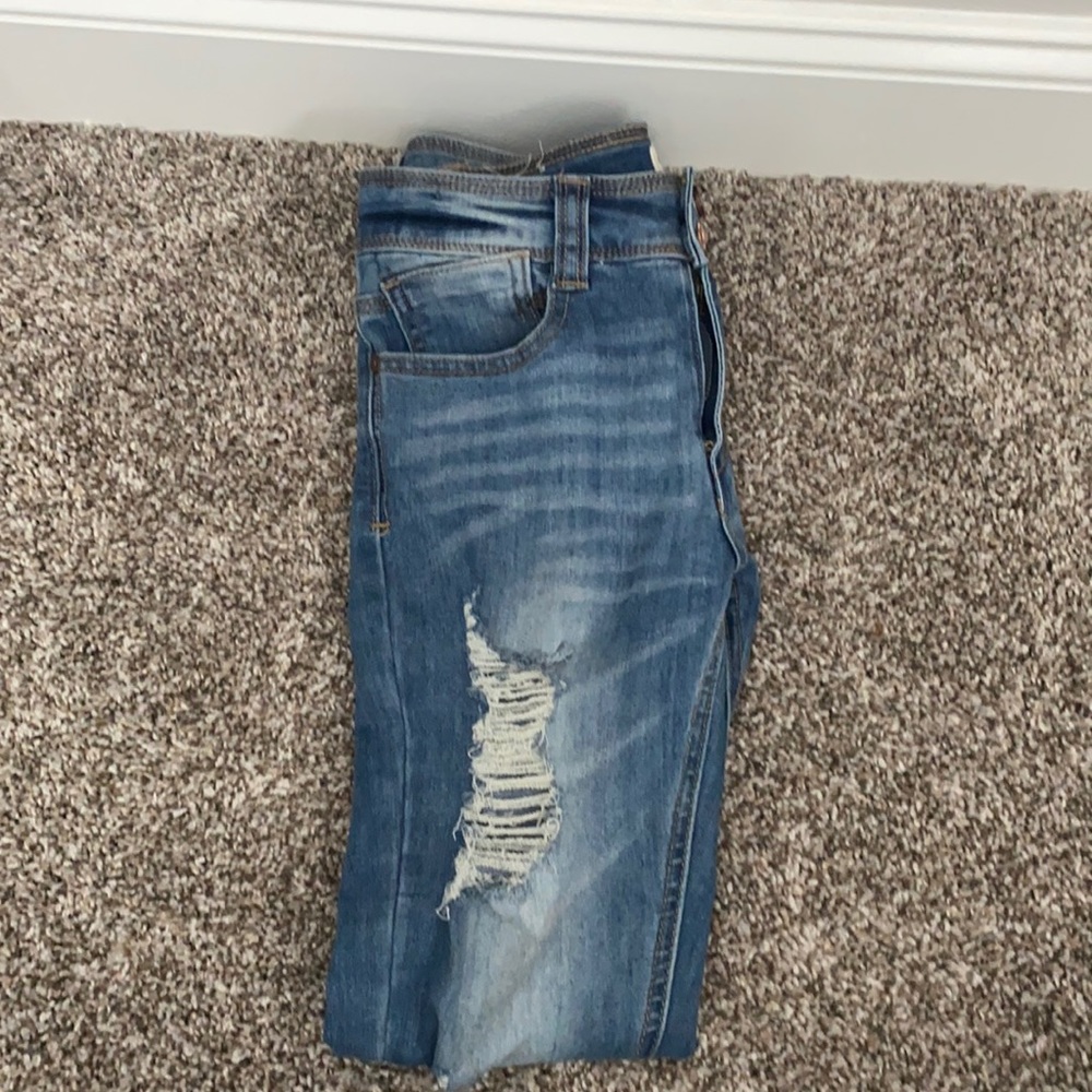 Ripped Blue Jeans